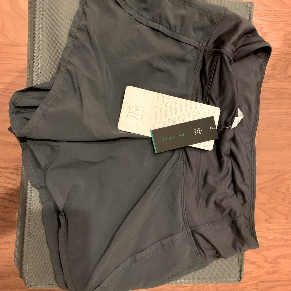 BRAND NEW LULULEMON charcoal color. Size 4